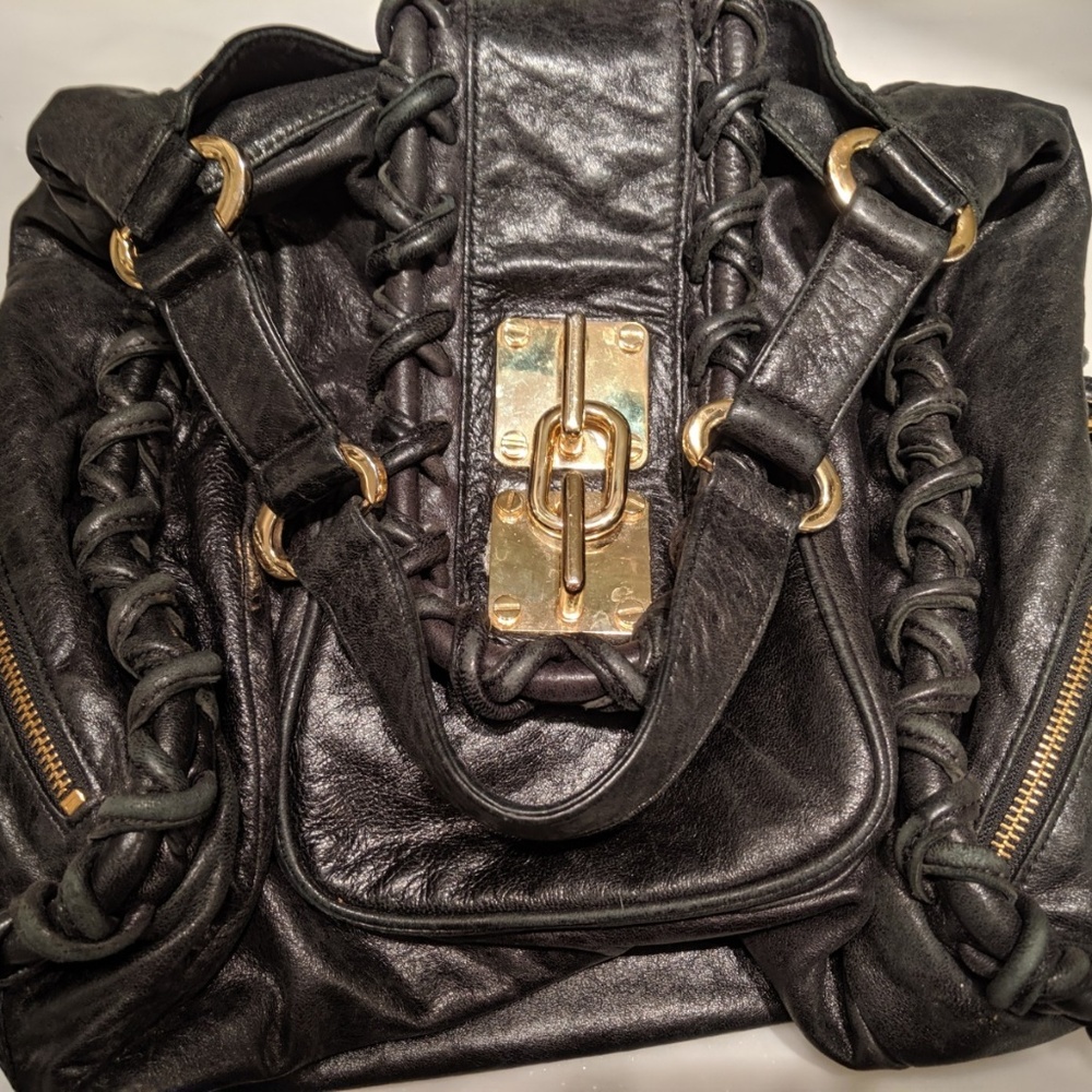 Statement purse TREESJE Braided black leather